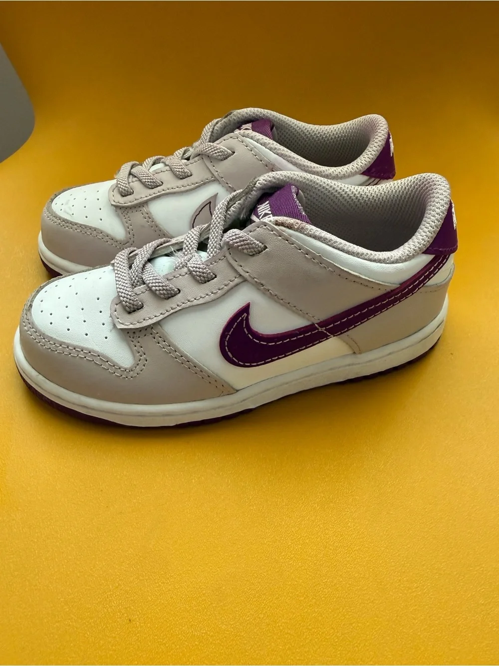 Nike Kids Low-Top Sneakers in White and Purple Accents